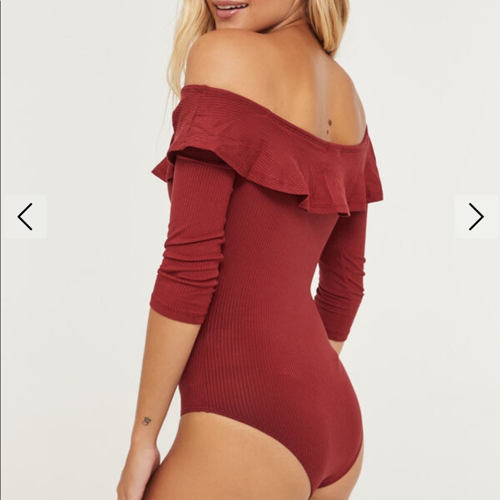 Off the Shoulder Ruffle Bodysuit in Brick Red